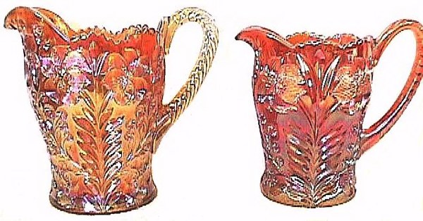 TIGER LILY water pitcher on left. TIGER LILY VARIANT-somewhat  smaller pitcher on right.