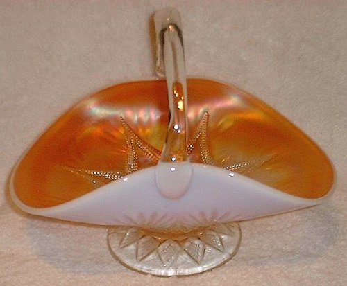 SKI STAR - COMPASS large handled basket (peach opal) - 8 and three-fourths in. long x 5 and three-fourth in. between handle points x 7 in. height - base to top of handle