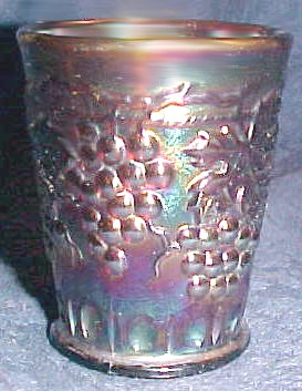 SHOT GLASS in amethyst- two and five-eighths in. tall x one and eleven-sixteenths in. base diam.---3 oz. content fills to the brim!