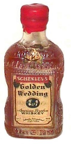 One-tenth of a pint of GOLDEN WEDDING Whiskey never opened.