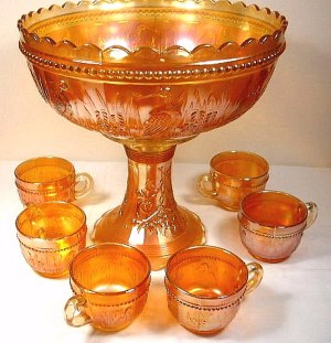 Stork & Rushes Punch bowl sitting atop a Summer Days vase!