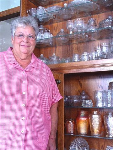 Kay Riley of Cicero, IN with her beloved Jenkins Glass Collection. 6-2-04