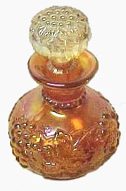 Dugan PERFUME BOTTLE has no cable, but rather a line of beads around the neck.