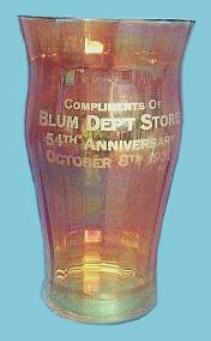 BLUM  DEPT STORE-54th Anniv. Oct. 8, 1930-5.5 in. tall x 3 in. opening x 2.25 in. base.