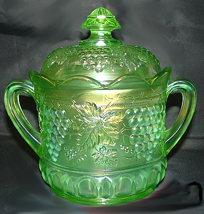 Ice Green Cookie Jar. 9 in. Handle to handle.Stands 8 in. to top of knob.