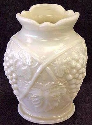 6 in. tall. Iridized-Pearlized PALM BEACH Vase.Opaque, such as on milk or custard base glass.Sold for $800. 5-28-05 Wroda Auction.