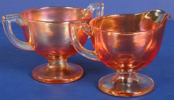 Westmoreland set in Marigold EGYPTIAN IRIDESCENT, as seen in the above Butler Bros. catalog ad. - Height - 3 in. - Width - 5.25 inches.