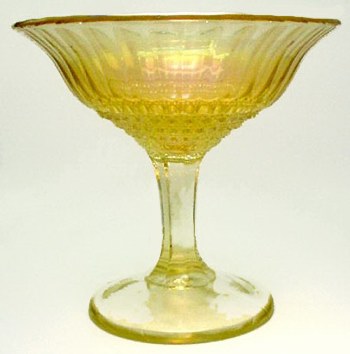 Clambroth FLUTE & CANE Compote-6.5 in. tall x 7 in. across top. This is a four part mold.Marigold is also known in this shape