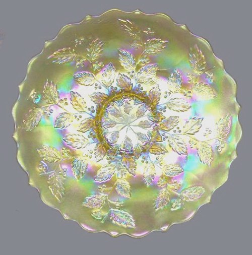 HOLLY Plate - 9.25 in. diam. in Yellow base glass. Courtesy Mickey Reichel..