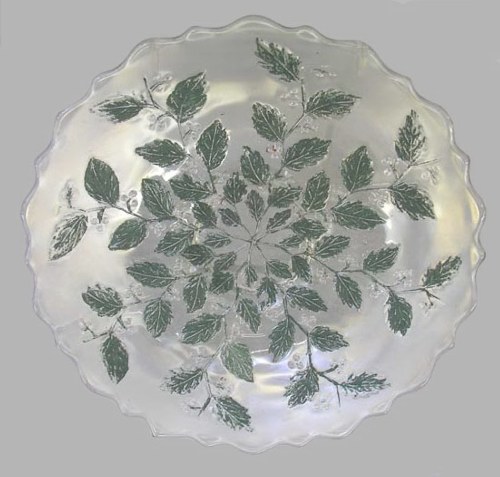 White HOLLY 9 in. plate with painted black leaves. $150. 8-08.
