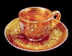 GRAPE & CABLE Cup & Saucer, Marigold.-$85.