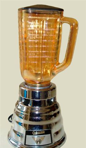 Vintage OSTERIZER model 236.  Series A with carnival glass pitcher.