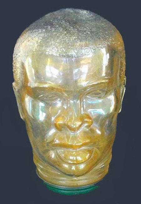 HEAD - $135. @ Seeck Auction.6.5 in. high, 13.25 in. brow circumference, 2.75 in. base.