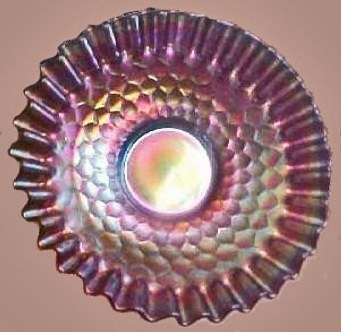 HONEYCOMB  Bowl in purple - 7 in. across x 2 in. deep. Has non-irid. smooth exterior.
